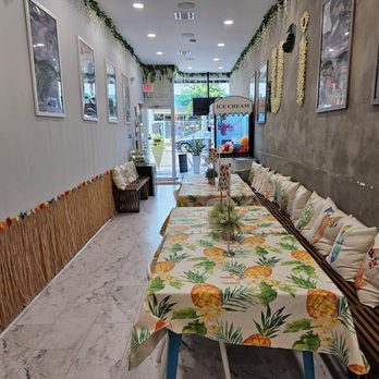 U'i Shrimp - a long table in a restaurant - Hawaiian Near Me - Tenafly, New Jersey