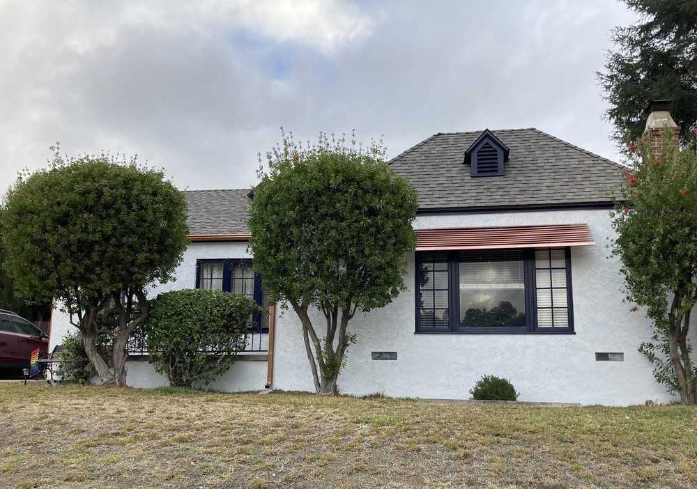 Slide of Pinecrest Roofing