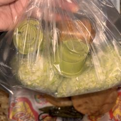Diced Cabbage, limes Red and green salsa.