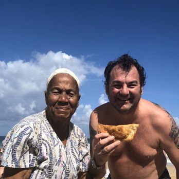 Empanada Lady - Delicious empanadas on Condado beach! Happy hubby!!! - Spanish Near Me - Condado, Puerto Rico