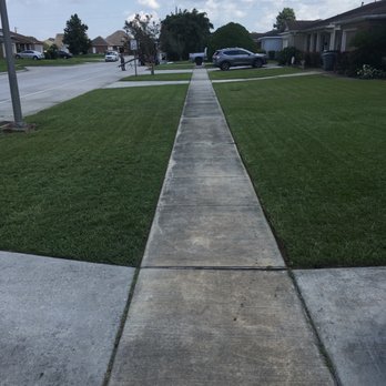 Lawn Rangers - a sidewalk in a residential neighborhood - Lawn Services Near Me Lawn Rangers - a sidewalk in a residential neighborhood - Lawn Services Near Me
