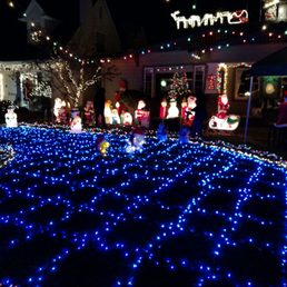 Photo of East Sacramento's Fab 40s Christmas Lights - Sacramento, CA, United States. Snoopy & Woodstock ice skating to Christmas music on the organ