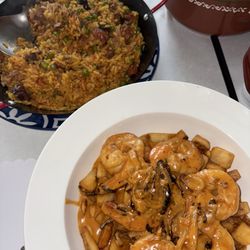 Otilia's Cafe - Shrimp in Whiskey Cream Sauce and duck with rice
