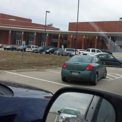 All American Driving School - The pick up driver setting a perfect example as he parks in handicapped parking while waiting for his students to arrive.