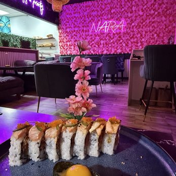 Nara Asian Creations - The Devil and Quail Egg SushiA La Cart with the NARA pink flower wall in the background - Sushi Bars Near Me - Jupiter, Florida