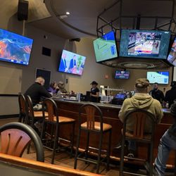 Giordano's - Plenty of TVs at the bar.