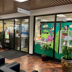 Burnaby Public Library - .. library entrance & display window.