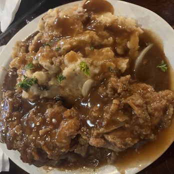 Kiki's Chicken and Waffles - Smothered Chicken Dinner - American Near Me - Columbia, South Carolina Kiki's Chicken and Waffles - Smothered Chicken Dinner - American Near Me - Columbia, South Carolina