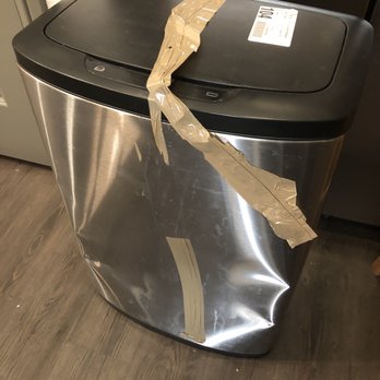 EZ Movers - They had 4 boxes stacked on top of my stainless trash can, while laying on it's side...who does that?! - Movers Near Me - Skokie, Illinois