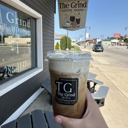 The Grind Coffee House - Iced coffee with vanilla cold foam and oat milk
