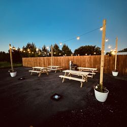 Bradshaw Sunset RV Park - Our social area with picnic tables and a gril
