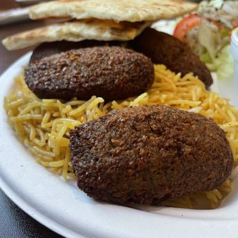 Ariana Kabob - a plate of food on a table - Kebab Near Me - Richmond, Virginia Ariana Kabob - a plate of food on a table - Kebab Near Me - Richmond, Virginia