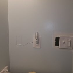 O'Malley Construction - The fix.. adding an outlet here in addition to the one above the sink/toilet we didn't want