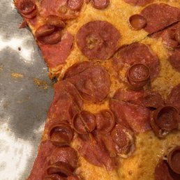 Very greasy no crust pizza