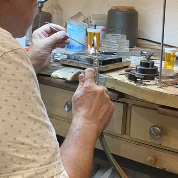 Glitz Jewelers - Marco melting the gold solder - Jewelry Near Me - Brooklyn, New York Glitz Jewelers - Marco melting the gold solder - Jewelry Near Me - Brooklyn, New York