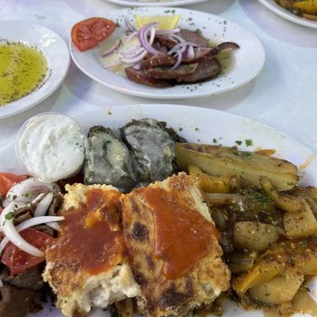 Hellas Restaurant - Combination platter (moussaka.gyro. pastitsio) Loukaniko. Dolmades. - Bakeries Near Me - Tarpon Springs, Florida