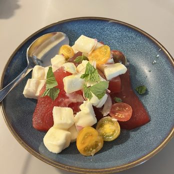 Dio Mio - Watermelon tomatoes salad ingredients, compressed watermelon, lemon vinaigrette, heirloom tomatoes, and mozzarella - Italian Near Me - Denver, Colorado