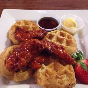 Commodore Grille - Yummy spicy chicken strips with mini waffles. Great balance of heat and sweetness - New American Near Me - Nashville, Tennessee Commodore Grille - Yummy spicy chicken strips with mini waffles. Great balance of heat and sweetness - New American Near Me - Nashville, Tennessee