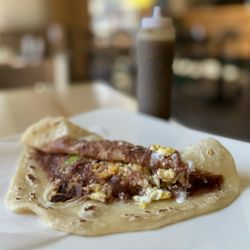 Catrachita Yucateca - Baleada Especial w/ fried beans, cheese, scrambled egg, avocado, sour cream | $6.99 (housemade habanero + jalapeno hot sauce)