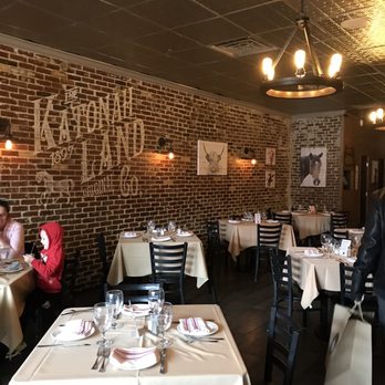 Farmhouse Tavern - a man and a woman sitting at a table - New American Near Me - Katonah, New York