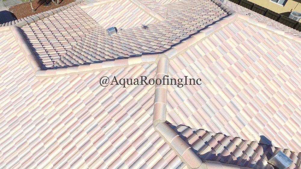 Slide of Aqua Roofing