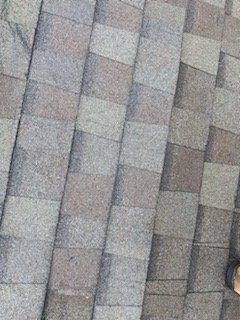 Slide of Johnny's Roofing and storm restoration