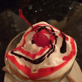 Prabh Indian Kitchen - Sundae interesting topping with whip cream and chocolate sauce with. Cherry top - Indian Near Me - Mill Valley, California