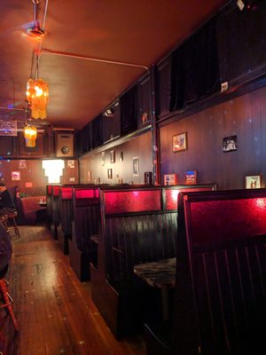 Photo of Dino's Tomato Pie - Seattle, WA, US. Indoor booths.