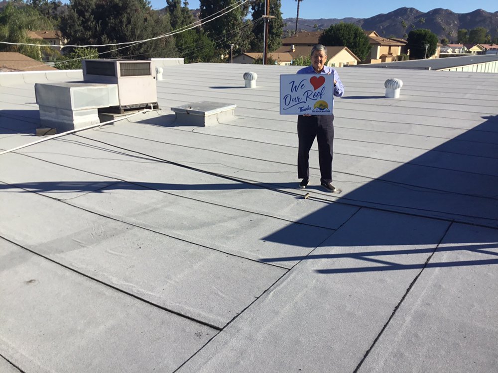 Slide of The Roof Masters