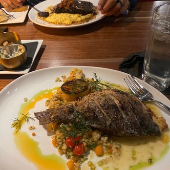 Melange - Sea Bass and other is pork tenderloin - New American Near Me - Canton, Ohio