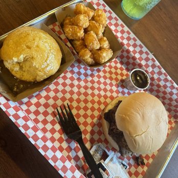 BP Smokehouse - Brisket sandwich with tater tots and cornbread muffin - Barbeque Near Me - Tomah, Wisconsin