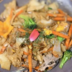 Undercooked Pad See Ew with boring gray beef.
