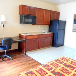Crossroads Inn & Suites - Work desk, Full Kitchenette, sink stove top, microwave and full size refrigerator and freezer