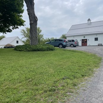 Thornbee Farm - a car parked in front of a barn - Farmers Market Near Me - Walworth, New York