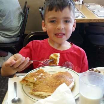 Corner Cafe - Shortstack of pancakes and a happy little boy. - Cafes Near Me - Creston, Washington