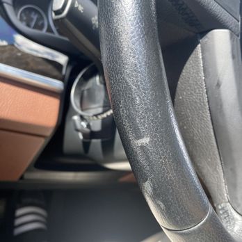 The Auto Firm - Damaged leather steering wheel from dash removal to replace a/c vents due to incompetent technicians - Auto Repair Near Me - Miami, Florida