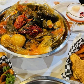 The Crawfish Hut - Combo 2 with clams and crawfish and potato's added. - Seafood Near Me - Burien, Washington