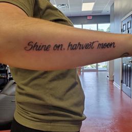 Forearm quote tattoo by Amber