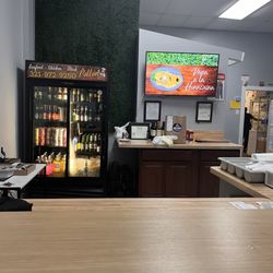El Pollon Peruvian Restaurant  - Cash register area