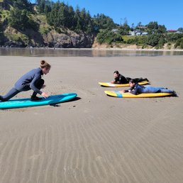 Surf Instructor Konnor and my 12 & 10 year old daughters learning some basic and safety about surfing before heading into the water. Surf Instructor Konnor and my 12 & 10 year old daughters learning some basic and safety about surfing before heading into the water.