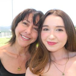 Neve Salon - At Truckee Tahoe Airport with my daughter, happy with my hair at last!