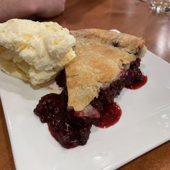 The Trapper Grill / Deadman's Bar - Signal Blackberry Pie (Marion blackberries in homemade tender crust) - Coffee & Tea Near Me - Moran, Wyoming The Trapper Grill / Deadman's Bar - Signal Blackberry Pie (Marion blackberries in homemade tender crust) - Coffee & Tea Near Me - Moran, Wyoming