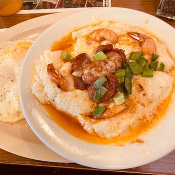 Stagecoach Restaurant - Cheesy shrimp grits with andouille sausage and side of fried eggs. - Breakfast & Brunch Near Me - Sacramento, California Stagecoach Restaurant - Cheesy shrimp grits with andouille sausage and side of fried eggs. - Breakfast & Brunch Near Me - Sacramento, California