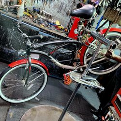 Bicycle Ambulance - Bike technician Newt, working on a nice sport-cruiser.