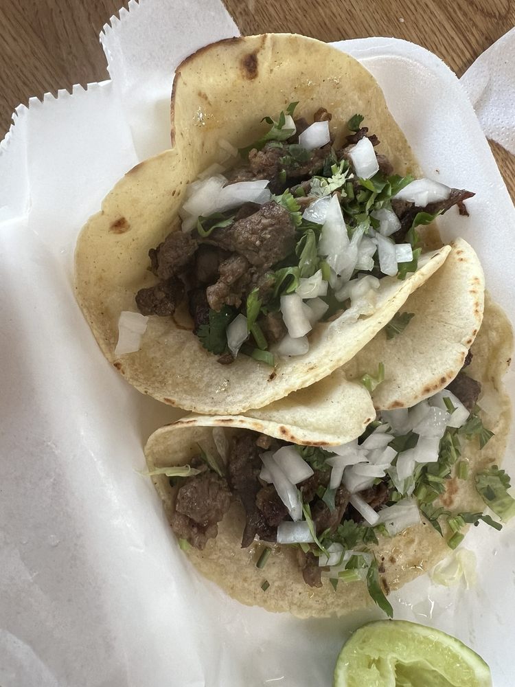 Taqueria Tacorriendo El Chino Logo