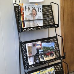 Village Barber Shop - Plenty of reading material.