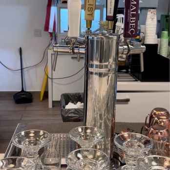 Caffe Gourmet - a variety of glasses on a table - Coffee & Tea Near Me - Weston, Florida
