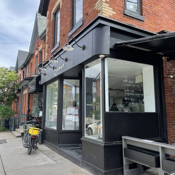 Emmer - a bicycle parked outside of a building - Bakeries Near Me - Toronto, Ontario