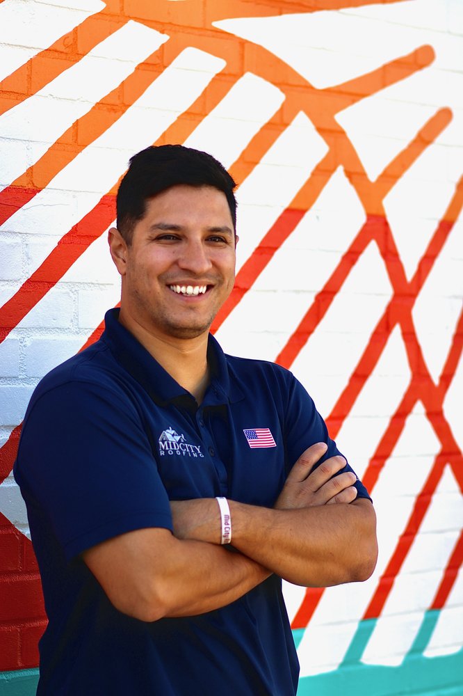 Slide of Mid City Roofing