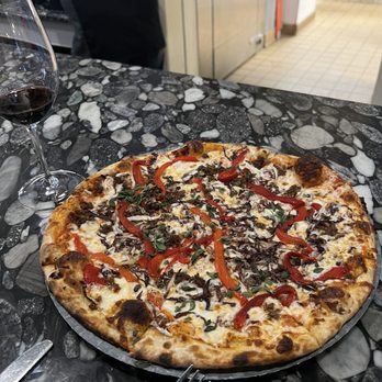 Plonk! Bistro & Wine Cellar - Sausage pizza - Wine Bars Near Me - Houston, Texas Plonk! Bistro & Wine Cellar - Sausage pizza - Wine Bars Near Me - Houston, Texas